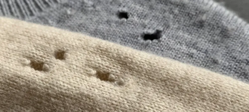 mens-sweater-damage