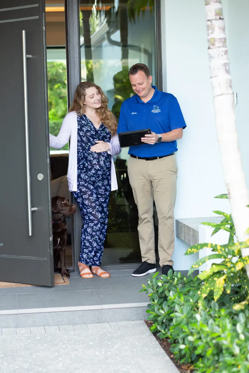 A Hulett employee greeting a customer at their home