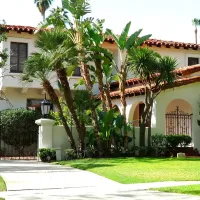 white house with brown roof