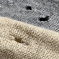 mens-sweater-damage