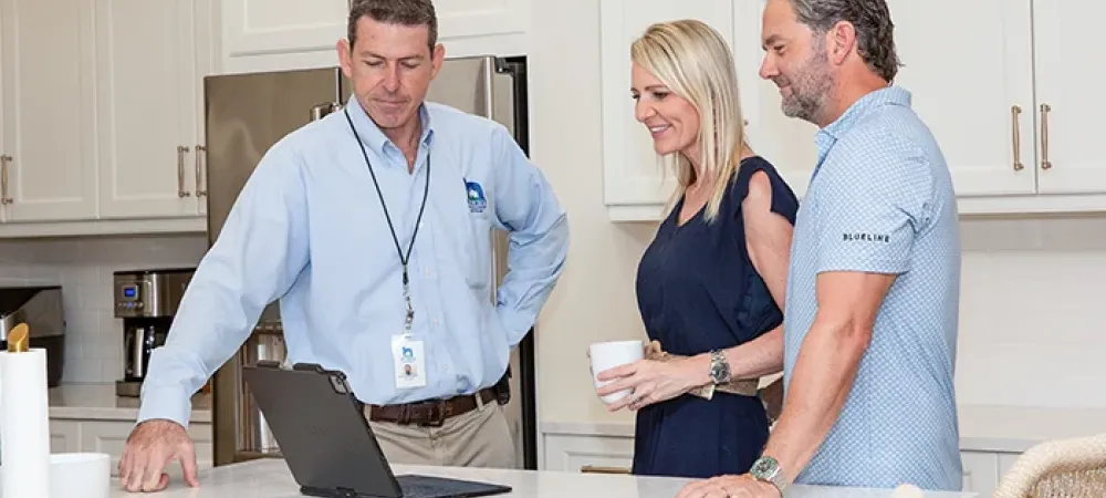 Technician meeting with homeowners