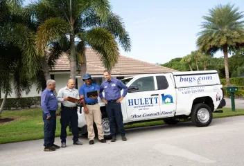 techs-in-front-of-truck