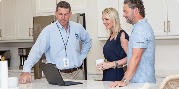 Technician meeting with homeowners